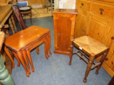 A MODERN YEW NEST OF TABLES, SMALL CABINET AND AN OAK STOOL (3)