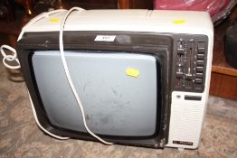 A VINTAGE PHILLIPS PORTABLE TELEVISION