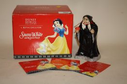 A BOXED ROYAL DOULTON DISNEY SHOWCASE COLLECTION SNOW WHITE AND THE SEVEN DWARFS EVIL QUEEN 'TAKE