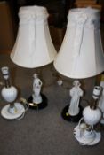 A PAIR OF FIGURAL TABLE LAMPS WITH SHADES, TOGETHER WITH A PAIR OF WHITE CERAMIC LAMPS (4)