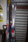 TWO PAIRS OF BLIZZARD SKIS PLUS SKI POLES