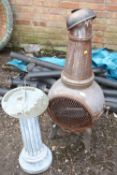 A METAL CHIMINEA A/F PLUS A SMALL SUNDIAL