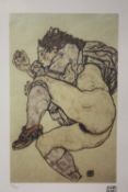 A FRAMED AND GLAZED LIMITED EDITION EGON SCHIELE ABSTRACT PRINT OF A SEMI NUDE FIGURE WITH
