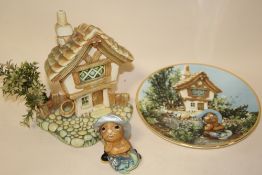 A PENDELFIN RABBIT WITH DISPLAY STAND AND A CABINET PLATE WITH MATCHING SCENE