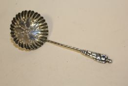 A HALLMARKED SILVER SIFTER SPOON