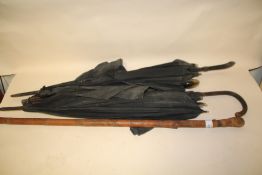 A CARVED BAMBOO WALKING CANE TOGETHER WITH FOUR VINTAGE PARASOLS A/F