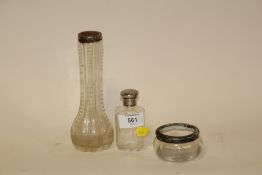 A HALLMARKED SILVER TOPPED SCENT BOTTLE TOGETHER WITH TWO SILVER RIMMED VASES A/F