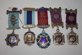 A COLLECTION OF BUFFALO MEDALS TO INCLUDE HALLMARKED SILVER AND ENAMEL EXAMPLES