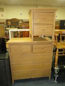 A MODERN FIVE DRAWER CHEST H-103 W-97 CM AND A SMALLER MATCHING BEDSIDE CHEST (2)