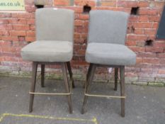 A PAIR OF MODERN SWIVEL BAR STOOLS