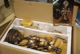 A BOXED MODERN FIGURATIVE MANTEL CLOCK