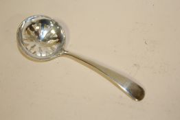 A HALLMARKED SILVER SIFTER SPOON