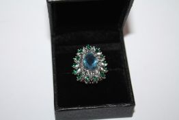 A MODERN FLORAL SET DRESS RING SIZE K1/2