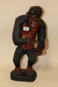 A MODERN CARVED WOODEN FIGURE OF KING KONG, H 50 CM