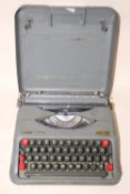 AN EMPIRE ARISTOCRAT PORTABLE TYPEWRITER