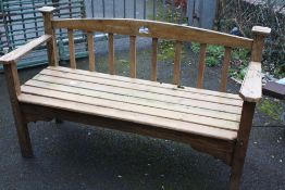 A WOODEN GARDEN BENCH - L 141 cm