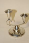 A HALLMARKED SILVER DUAL BRANCH CANDLESTICK
