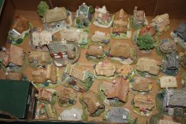 A COLLECTION OF LILLIPUT LANE COTTAGE FIGURES