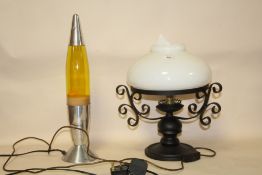 A MODERN CAST METAL TABLE LAMP WITH GLASS SHADE A/F TOGETHER WITH A LAVA LAMP (2)
