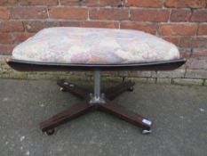 A RETRO STYLE STOOL ON CASTORS