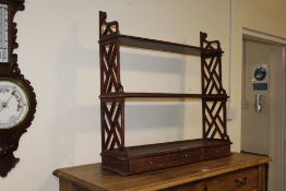 A MAHOGANY HANGING SHELF WITH DRAWERS H-76 W-77 CM