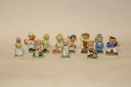 A COLLECTION OF FRANKLIN MINT PORCELAIN TEDDY FIGURES PLUS ANOTHER (11)