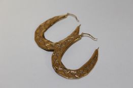 A PAIR OF YELLOW METAL HOOP EARRINGS STAMPED 9K APPROX WEIGHT - 2.3G