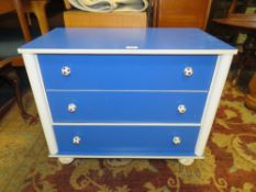 A MODERN THREE DRAWER 'FOOTBALL' CHEST H-59 W-73 CM