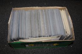 A BOX OF VINTAGE POSTCARDS