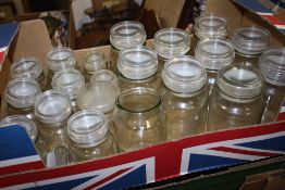 TWO BOXES OF VINTAGE GLASS TO INCLUDE JELLY MOULDS, LIDDED STORAGE JARS ETC.