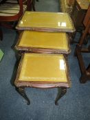 A HEAVY OAK DROPLEAF TABLE WITH AN OAK FRAMED FIRESCREEN AND A GLASS TOPED NEST OF TABLES (3)