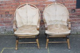 A PAIR OF HOOP BACK ARMCHAIRS