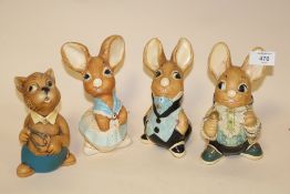 FOUR LARGE PENDELFIN RABBIT FIGURES