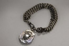 A VINTAGE SILVER WATCH CHAIN ADAPTED INTO A BRACELET WITH HALLMARKED SILVER FOB APPROX WEIGHT - 53.