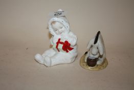 A ROYAL DOULTON WINNIE THE POOH COLLECTION 'EEYORE'S BIRTHDAY' FIGURE TOGETHER WITH A ROYAL