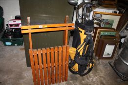 A GOLF BAG AND CLUBS TO INCLUDE HOWSON, DONNAY ETC TOGETHER WITH A WOODEN SLEDGE