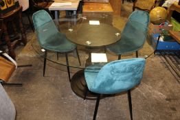 A MODERN CIRCULAR GLASS TOPPED PEDESTAL DINING TABLE WITH THREE CHAIRS