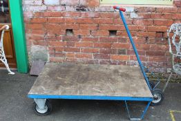 A LARGE FLATBED TROLLEY 120 CM X 81 CM
