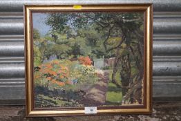 A GILT FRAMED IMPRESSIONIST OIL ON CANVAS DEPICTING A GARDEN SCENE - SIZE - 36CM X 31CM
