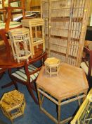 A COLLECTION OF WICKER FURNITURE TO INCLUDE A FOLDING BOOKCASE, GLASS TOPPED TABLE, HEXAGONAL