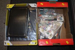 TWO TRAYS OF ASSORTED STAMPS TO INCLUDE ALBUMS
