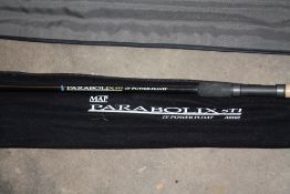 A SHIMANO PERFECTION FEEDER FISHING ROD TOGETHER WITH A MAP PARABOLIX ST1 POWER FLOAT ROD