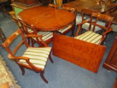A MODERN YEW WOOD TWIN PEDESTAL DINING TABLE WITH ONE EXTRA LEAF AND SIX CHAIRS ( 4 + 2 )