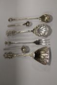A BAG OF ASSORTED SILVER AND WHITE METAL SPOONS ETC