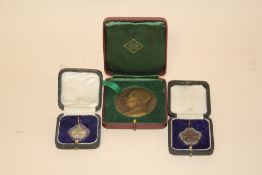 A CASED HALLMARKED SILVER AND ENAMEL FOR 'THE INCORPORATED LONDON ACADEMY OF MUSIC' FOB MEDAL