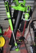 A GREENWORKS STRIMMER, HEDGE CUTTER AND LEAF BLOWER TOGETHER WITH A BATTERY CHARGER HOUSE CLEARANCE