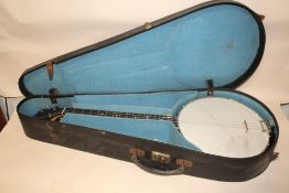A CASED VINTAGE C.S BANJO