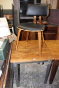 A MODERN INDUSTRIAL STYLE SMALL TABLE WITH ONE MODERN DINING CHAIR