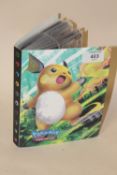 A FOLDER OF MODERN REPRODUCTION POKEMON CARDS