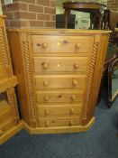 A PINE SIX DRAWER CORNER CHEST H-121 W-102 CM